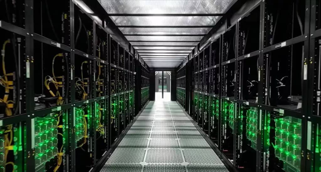 Room of cloud server racks with green glowing lights