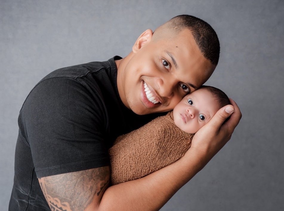 Henrique y su hijo Noah 