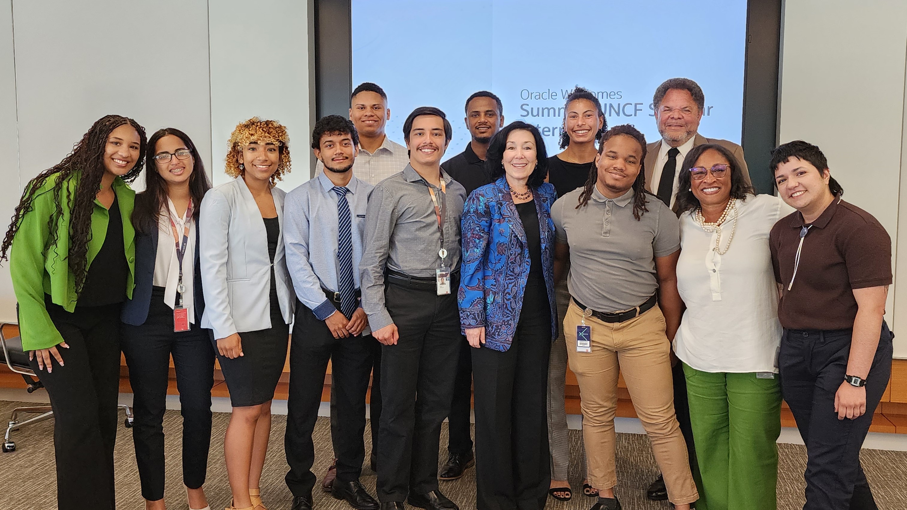 Oracle CEO Safra Catz (front middle), Oracle Education Foundation Board Member Dr. John Bough (back right) and Oracle Diversity & Inclusion GVP Traci Wade (front right) with Oracle UNCF Scholars