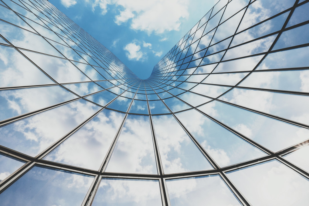 Image of the sky reflecting against a building