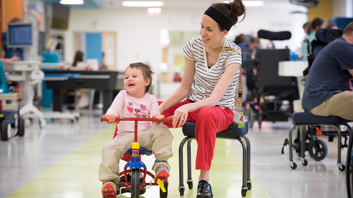 Rehab gym therapist with PT bike