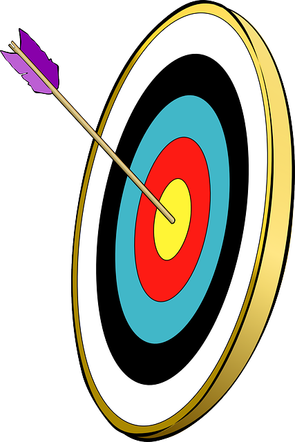 Arrow hitting target bullseye