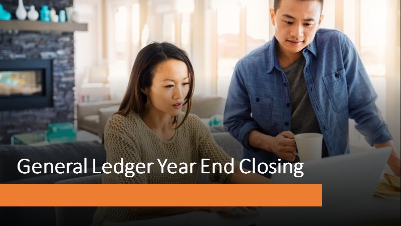 Man and woman at a computer