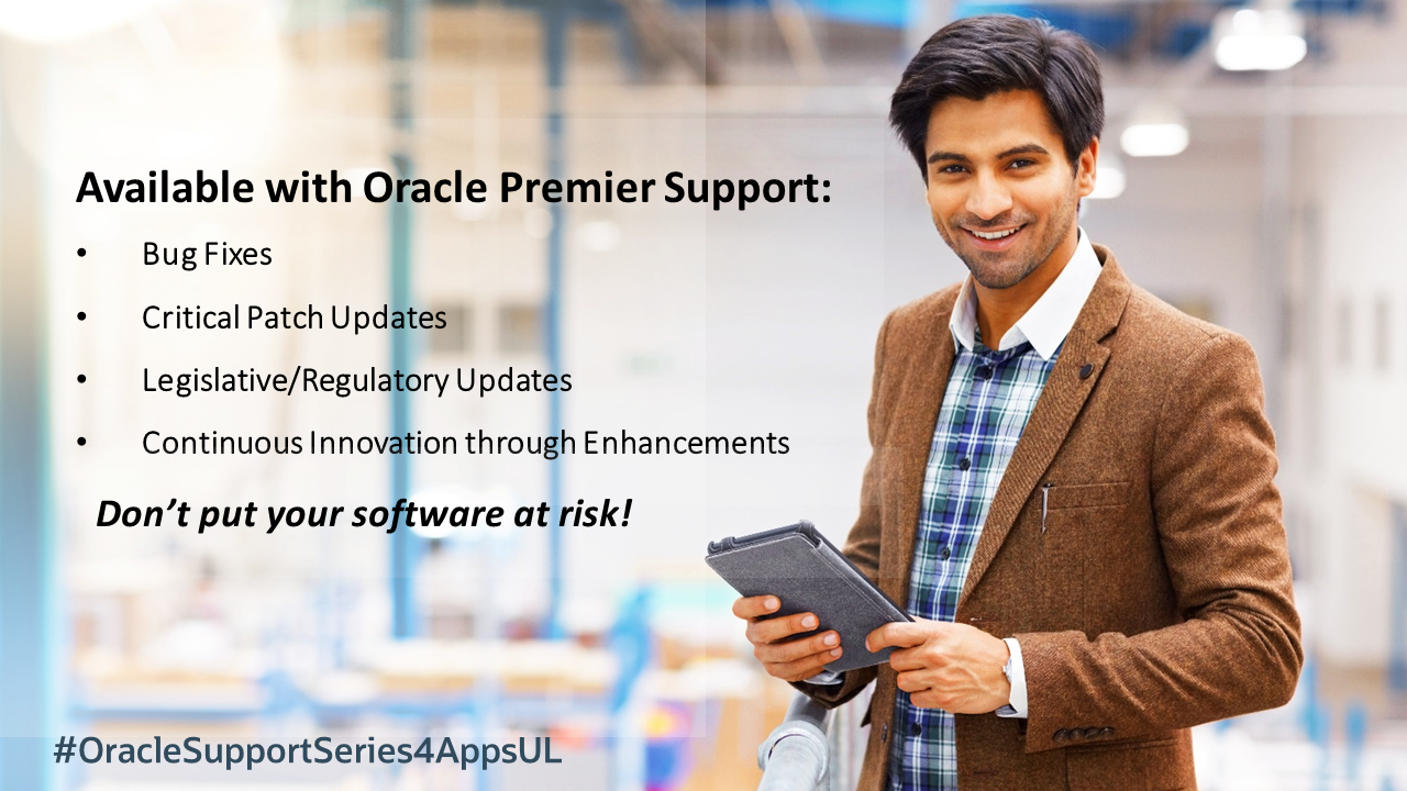 Man smiling holding a device