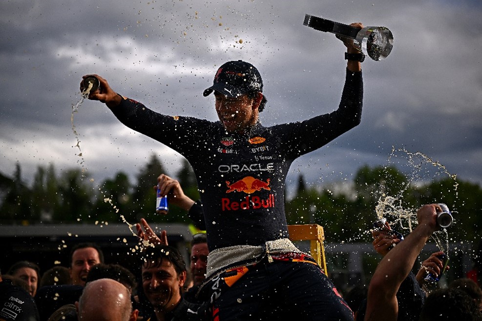 A picture that shows Sergio Perez celebrating his second-place finish at the 2022 Emilia Romagna Grand Prix.