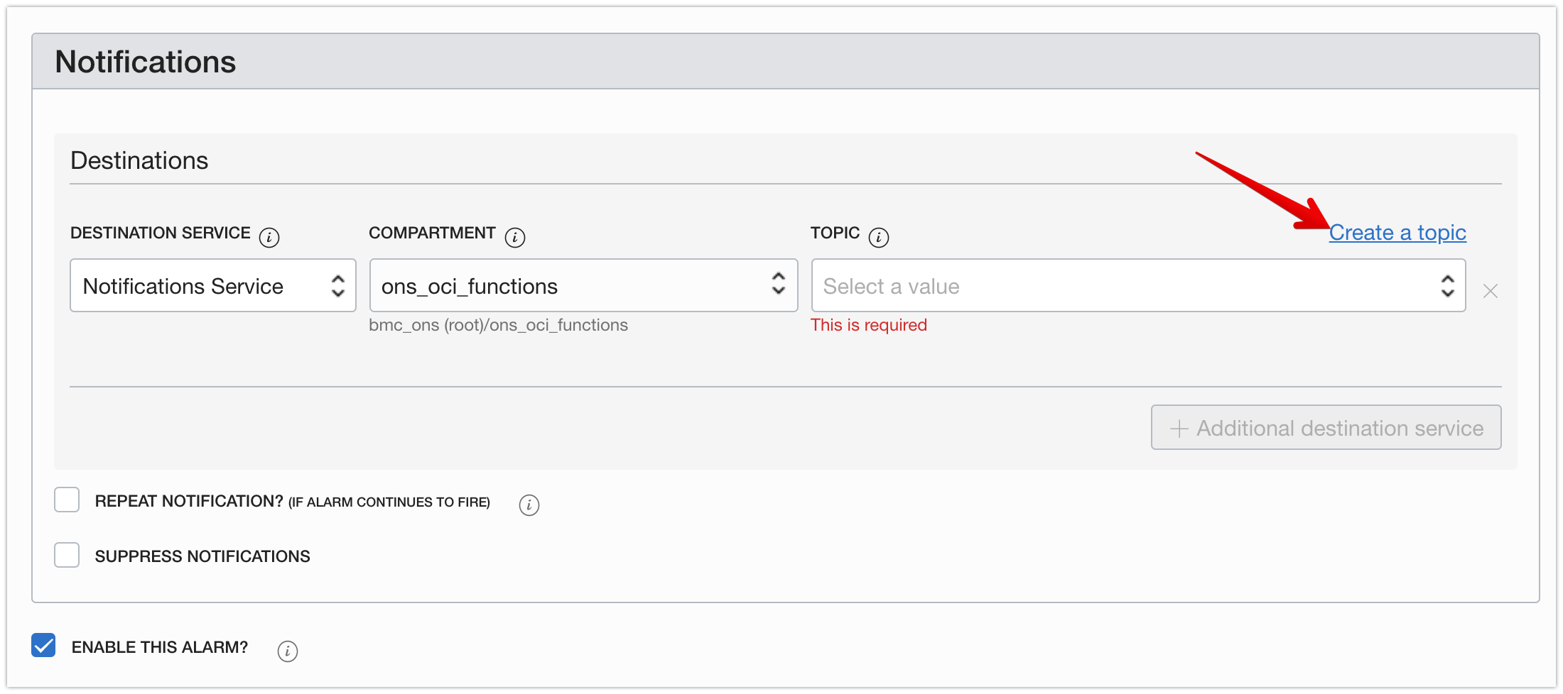 Screenshot that shows the Create Alarm dialog box with the Notifications area in focus and the Create a topic link highlighted.