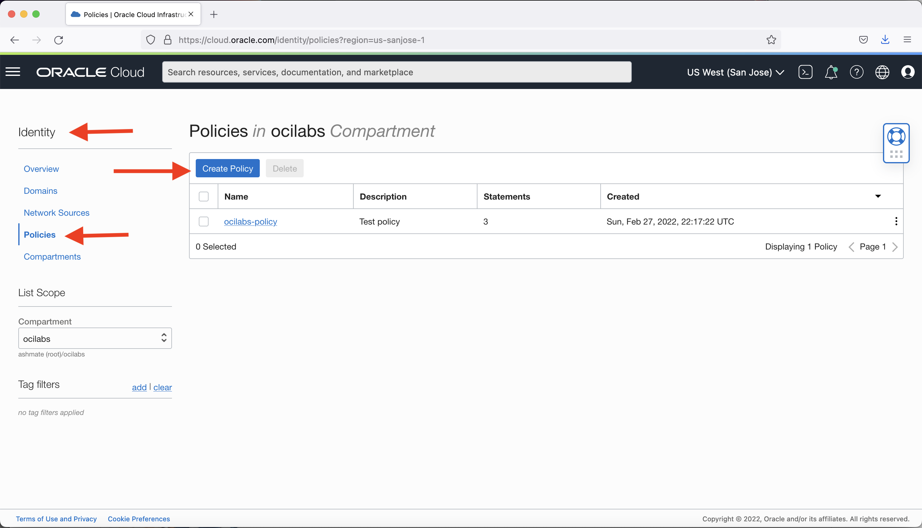 A screenshot of the Policies page with red arrows point to the Policies option in the Identity menu and the Create Policy button.