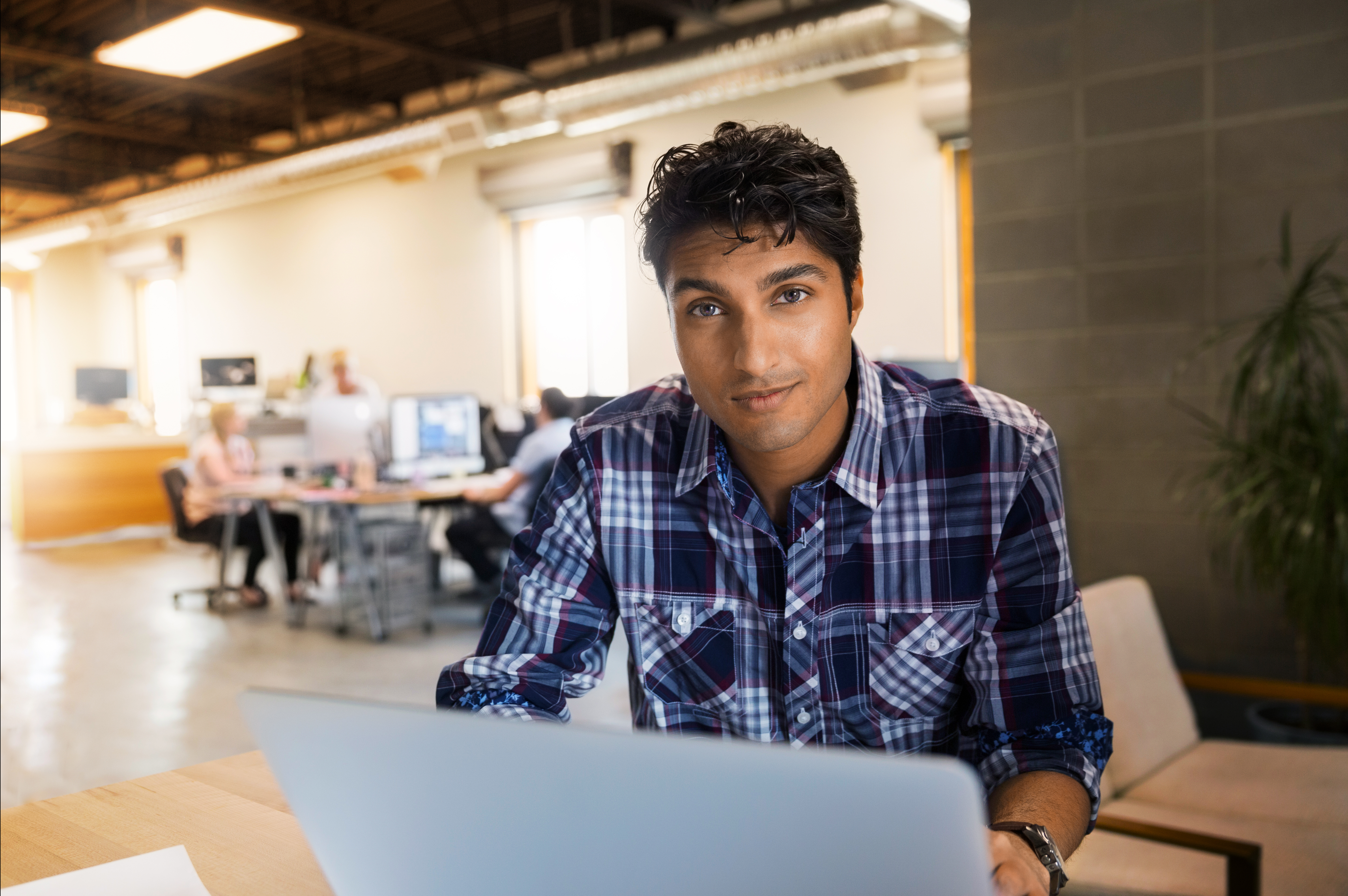 Man in front of laptop