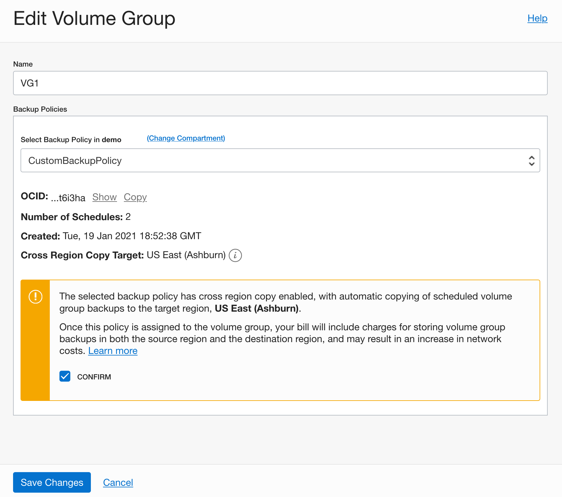 A screenshot of the Edit Volume Group window, showing the yellow caution notification about cross-region copy being enabled with the Confirm box.