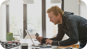 man online shopping with credit card