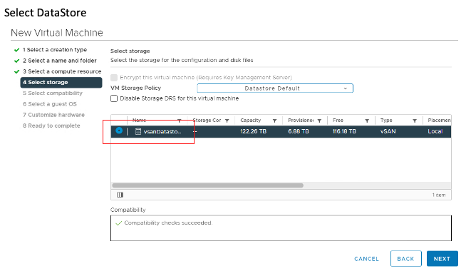 A screenshot of the fourth tab, Select storage, with the vsanDatastore highlighted and outlined in red.